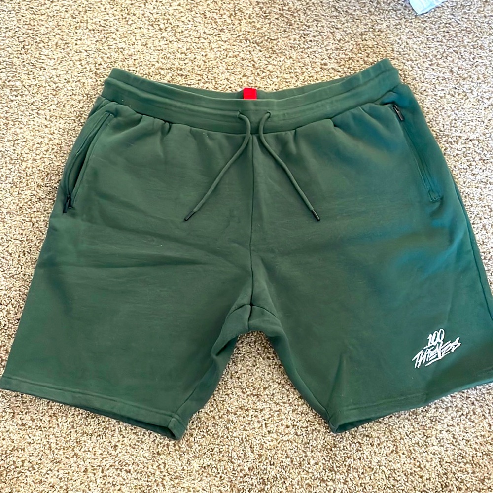 100 Thieves brand, fleece shorts in Alpine green.